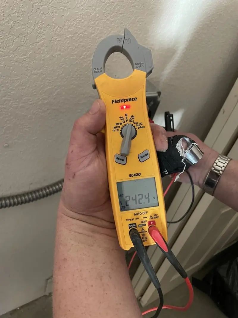 Voltage testing with clamp meter during Generator Installation in Moose Lake
